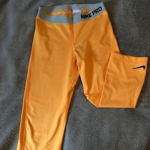 Bright Orange Nike Pro cropped leggings